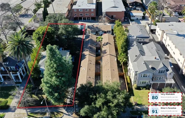 a view of a parked cars in front of a house