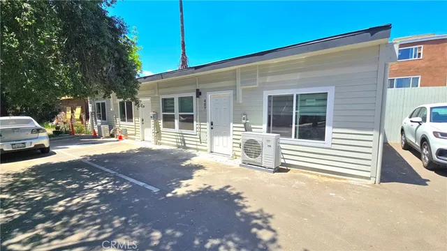 a front view of a house with a patio