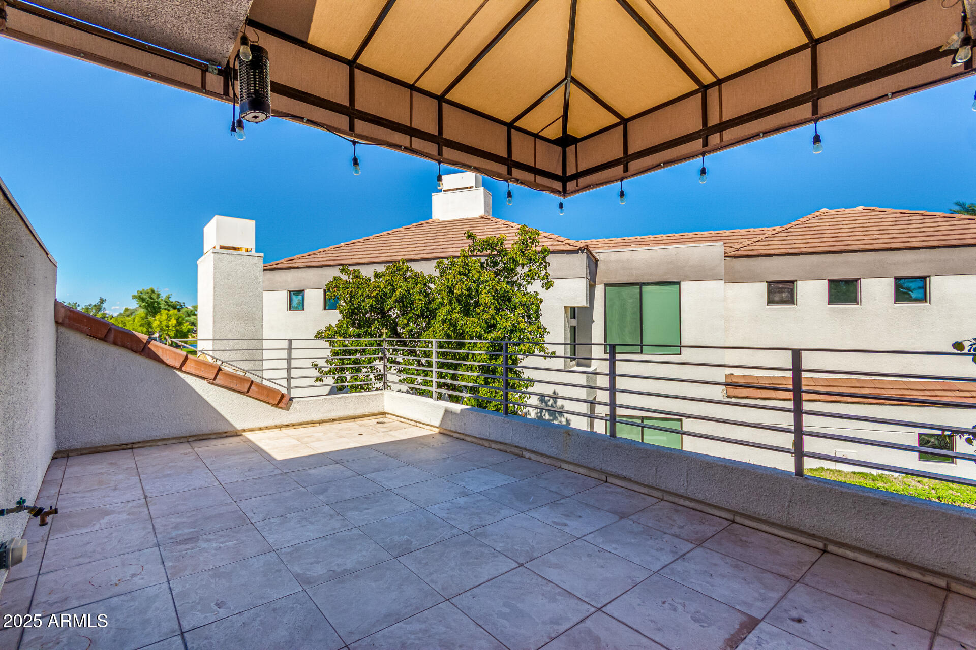 7222 East Gainey Ranch Road, Unit 241 Scottsdale, AZ 85258 - Photo 14 of 74 a view of a terrace with a small space