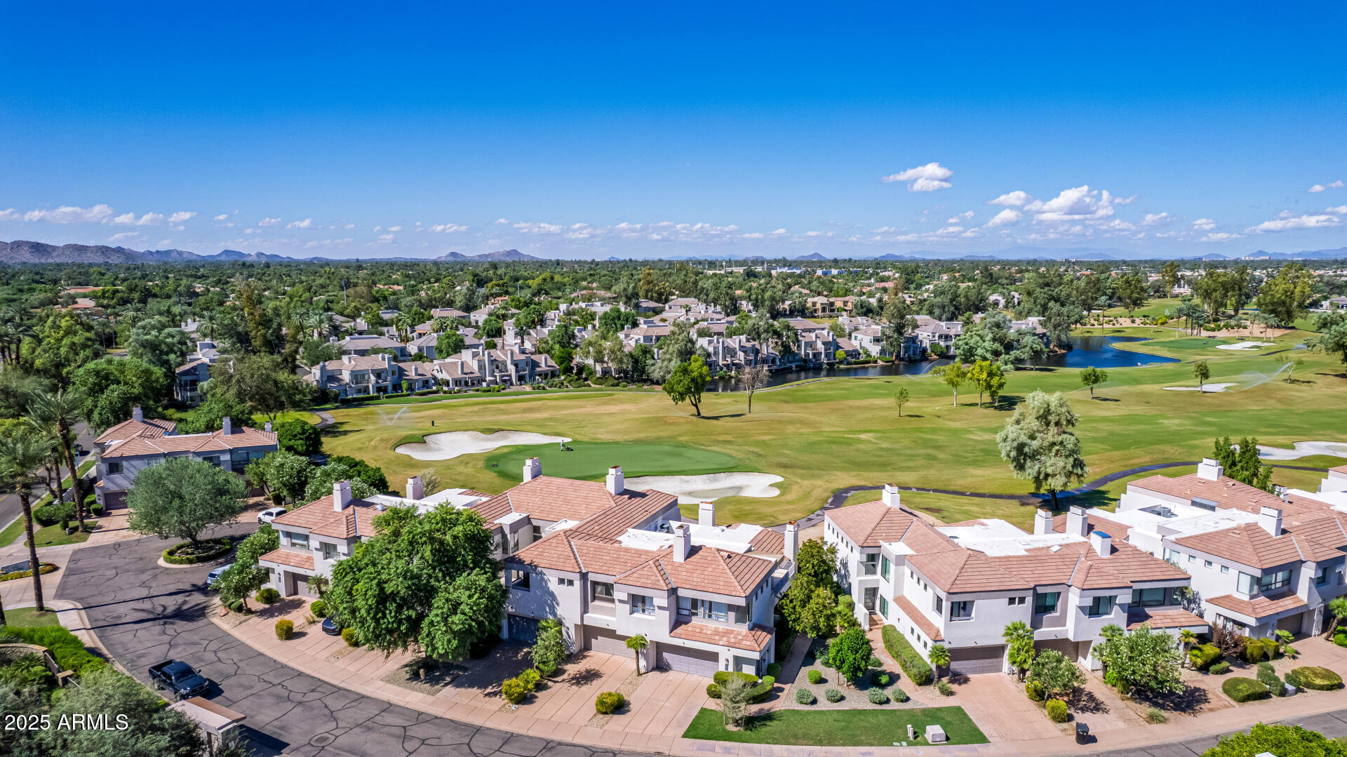 7222 East Gainey Ranch Road, Unit 241 Scottsdale, AZ 85258 - Photo 54 of 74 a view of a city with an ocean view