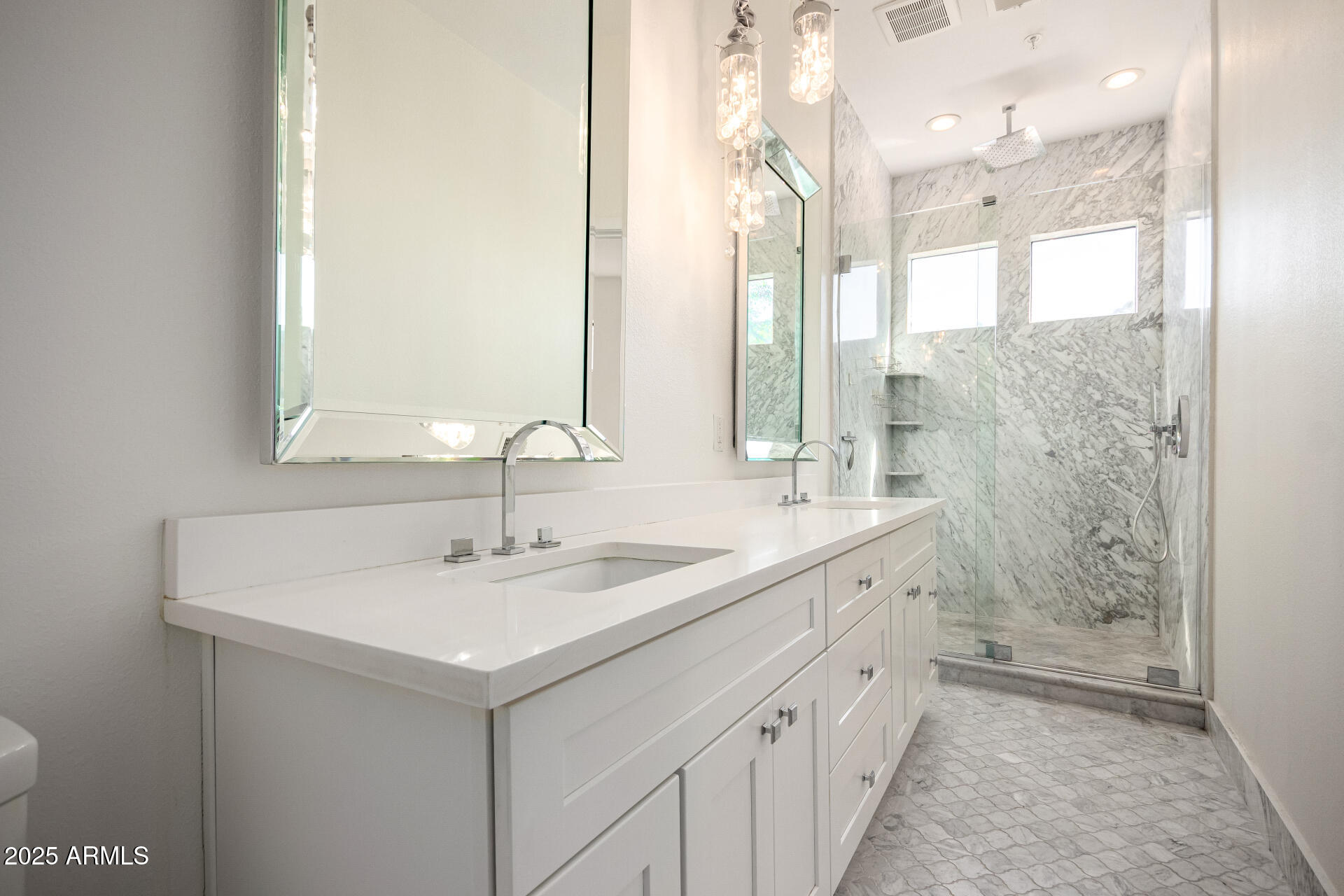 7222 East Gainey Ranch Road, Unit 241 Scottsdale, AZ 85258 - Photo 10 of 74 a bathroom with a double vanity sink mirror and shower