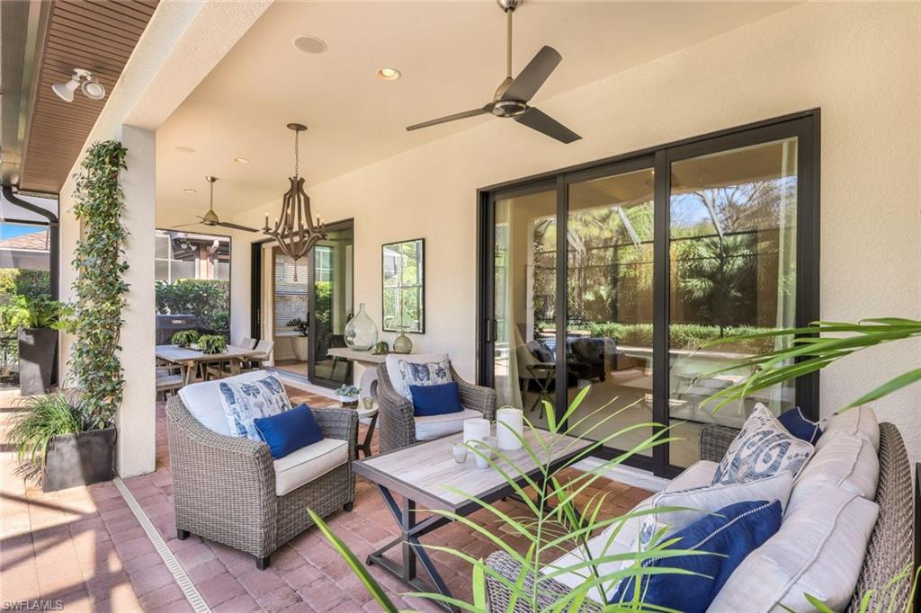 6573 Roma Way Naples, FL 34113 - Photo 28 of 49 View of patio featuring ceiling fan and outdoor lounge area