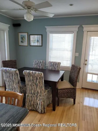a living room with furniture rug and window