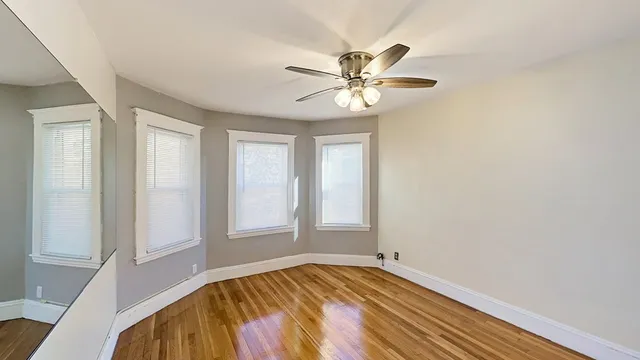a view of an empty room and window