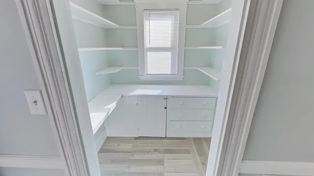 a view of an empty walk in closet