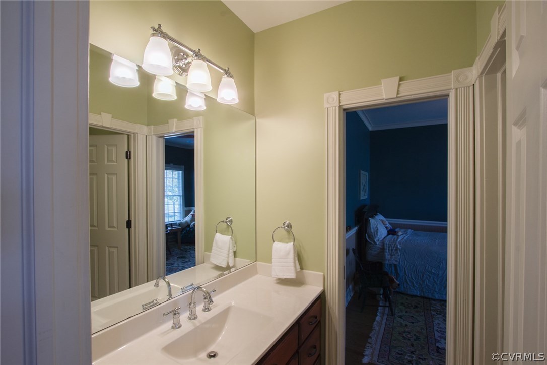 11908 Winterpock Road Chesterfield, VA 23838 - Photo 22 of 50 a bathroom with a sink and a mirror