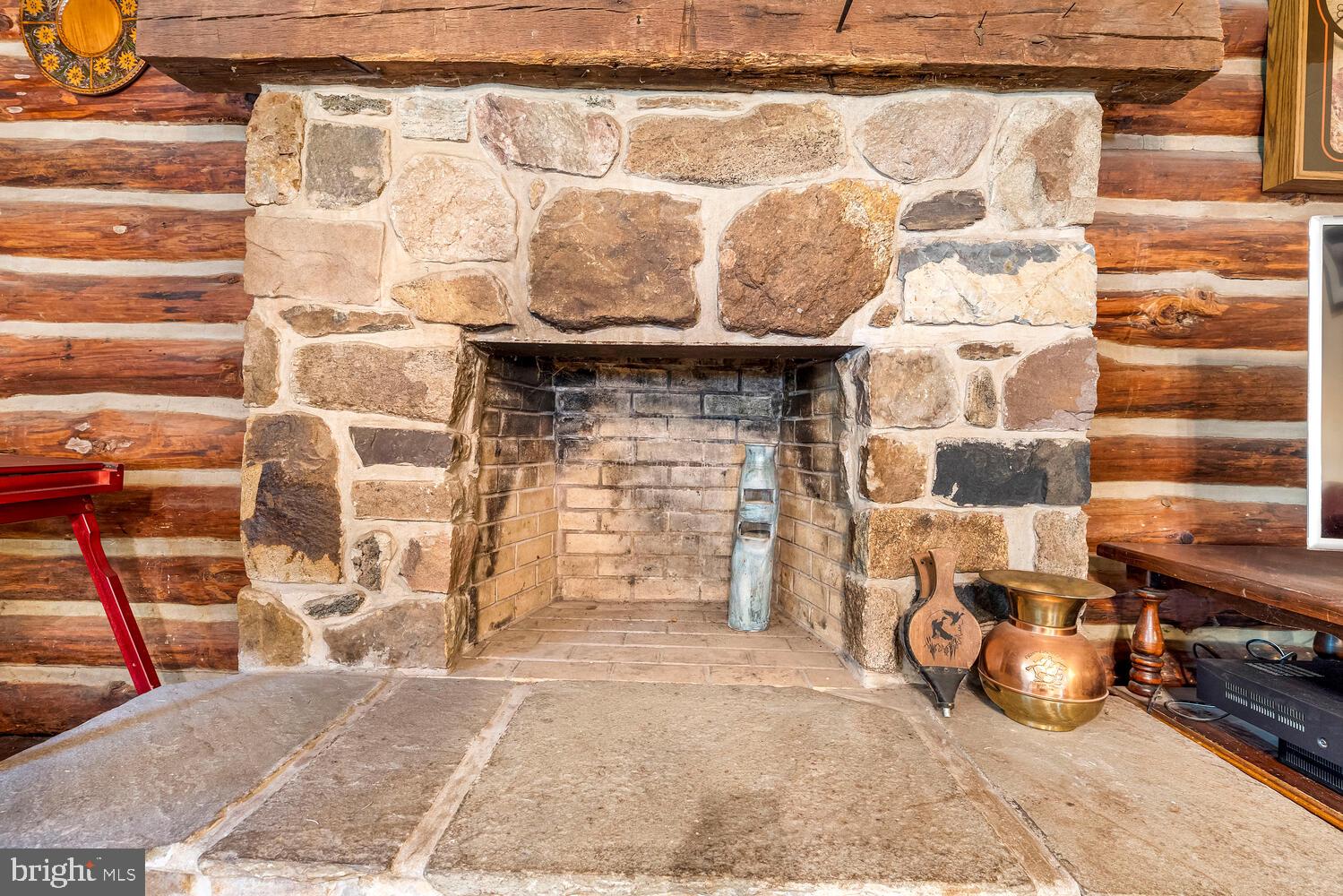 1464 Chestnut Ridge Road Upper Black Eddy, PA 18972 - Photo 10 of 32 Wood burning fireplace in Family Room