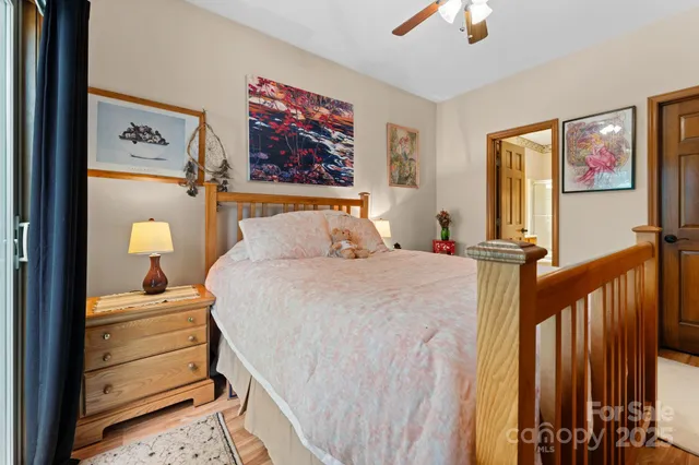 an aerial view of a house with yard and outdoor seating