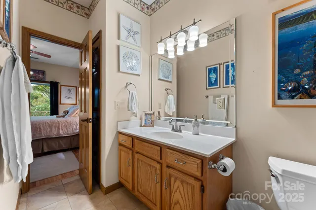 an aerial view of a house with swimming pool and patio