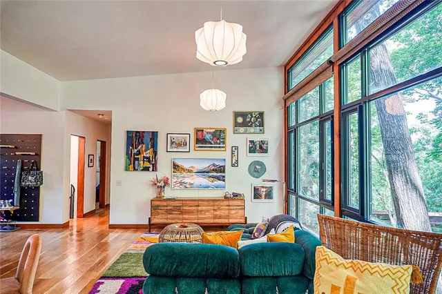 a bedroom with furniture and a window