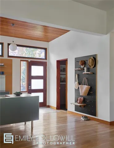 a view of a living room and bathroom