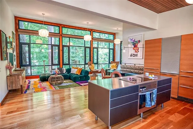 a view of a kitchen with a large window