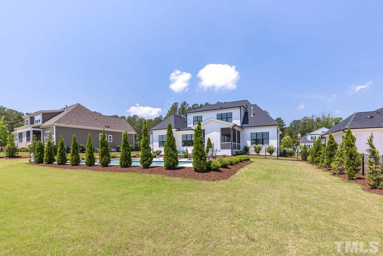 1709 Montvale Grant Way Apex, NC 27523 - Photo 56 of 68 a view of a building with a yard