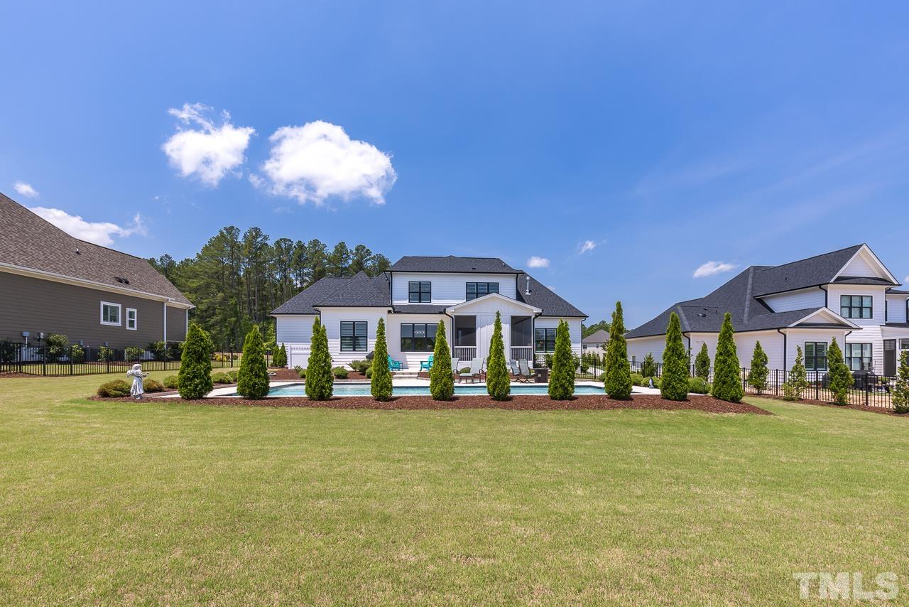 1709 Montvale Grant Way Apex, NC 27523 - Photo 57 of 68 a front view of a building with parked cars