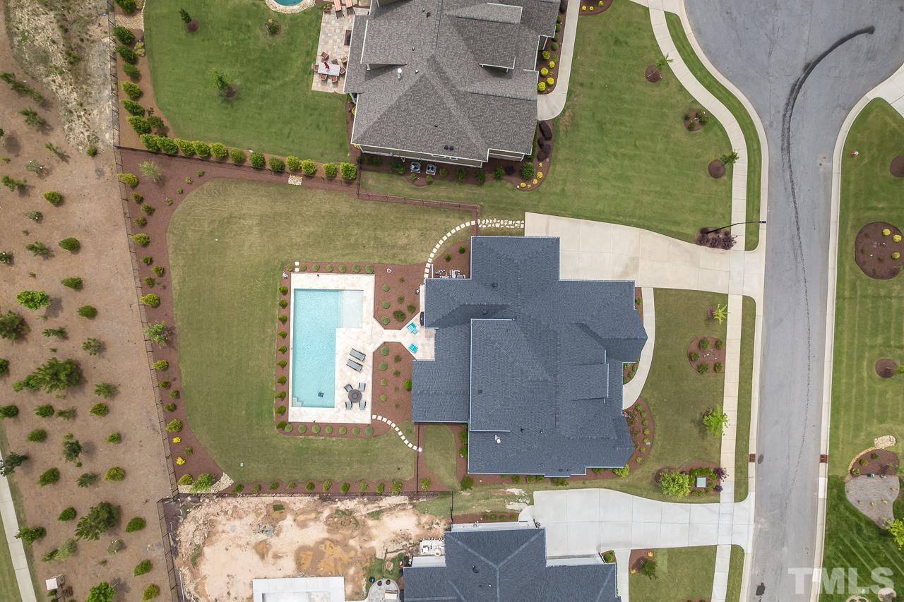 1709 Montvale Grant Way Apex, NC 27523 - Photo 65 of 68 an aerial view of a house with a yard