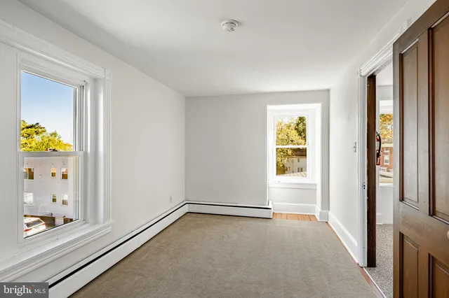 a view of an empty room and window