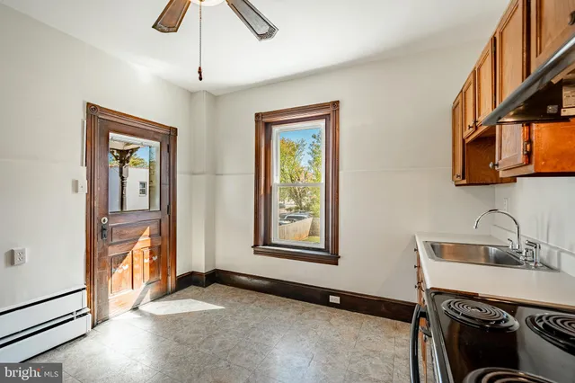 a view of an entryway with a workspace