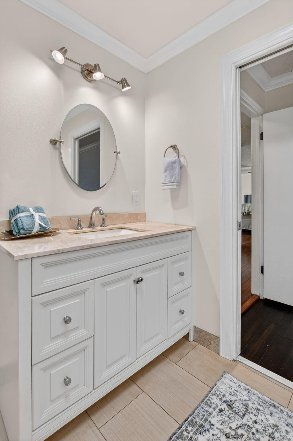 1311 Southwest 14th Avenue Boca Raton, FL 33486 - Photo 27 of 54 a bathroom with a double vanity sink and a mirror