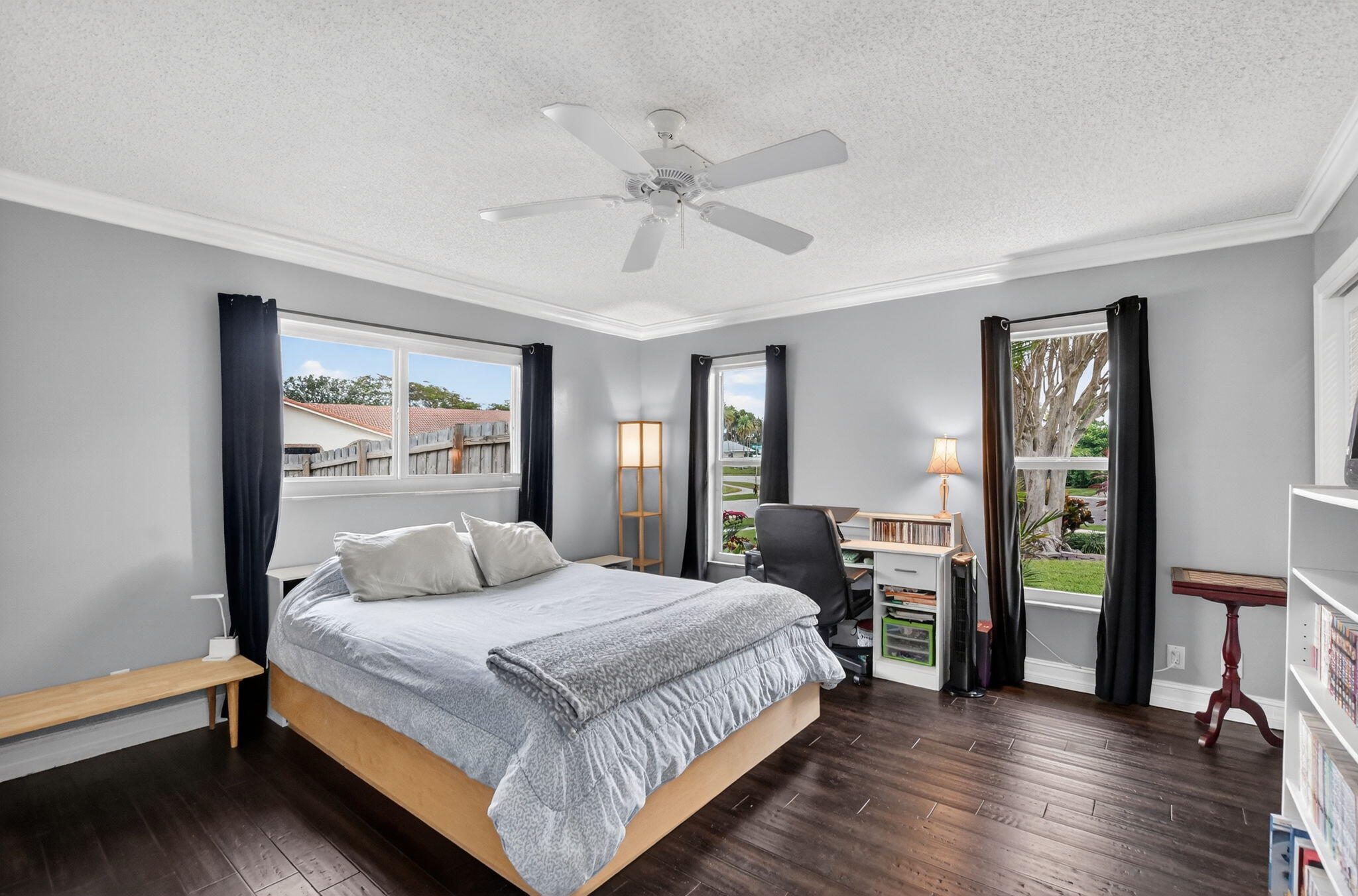 1311 Southwest 14th Avenue Boca Raton, FL 33486 - Photo 29 of 54 a bedroom with a bed and a table