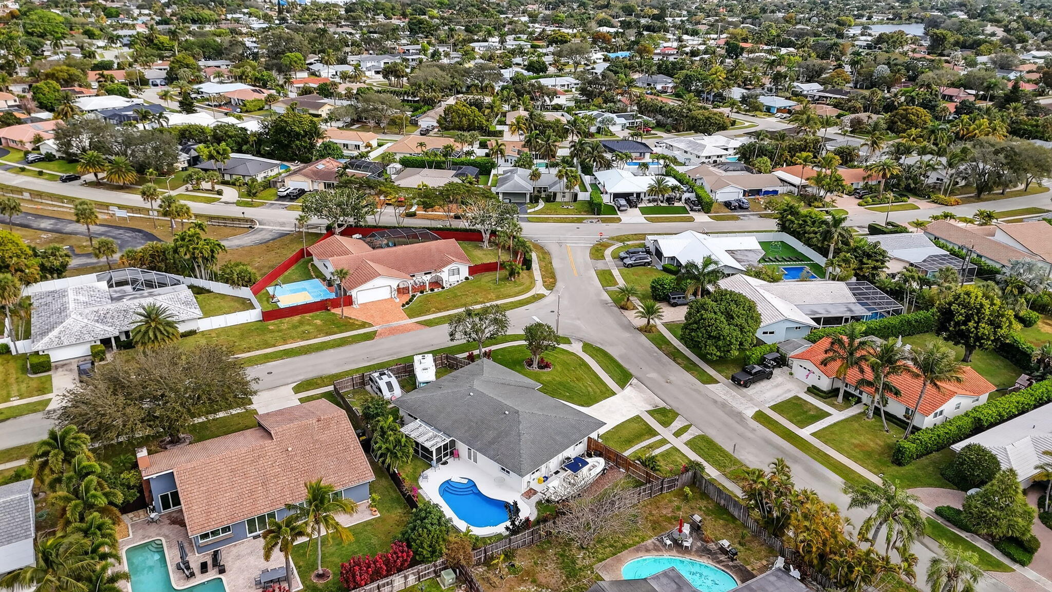 1311 Southwest 14th Avenue Boca Raton, FL 33486 - Photo 50 of 54 an aerial view of residential houses with outdoor space