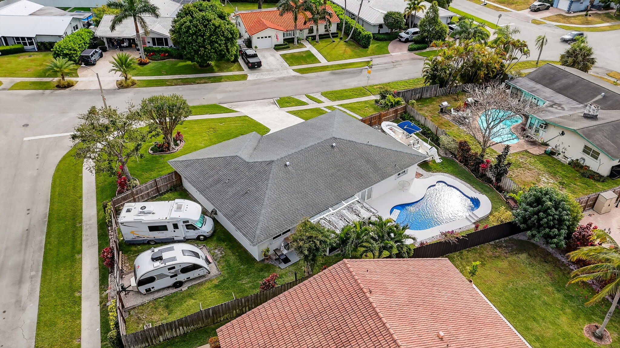1311 Southwest 14th Avenue Boca Raton, FL 33486 - Photo 51 of 54 an aerial view of a house with garden space and street view
