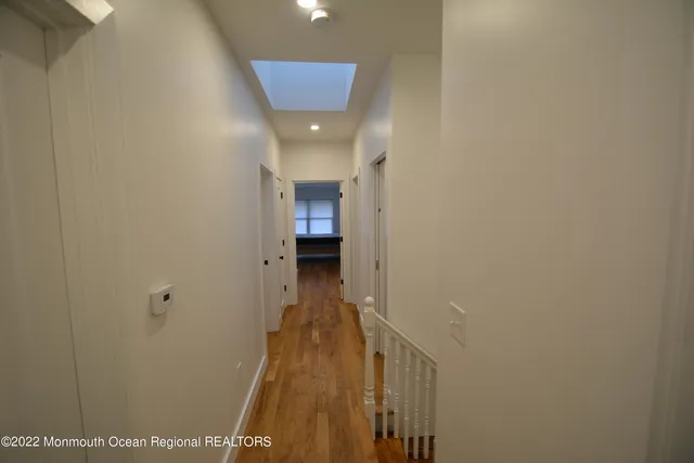 a view of hallway with stairs