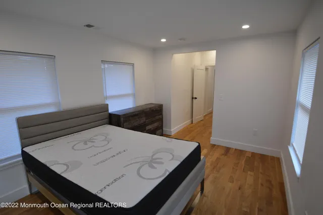 a view of kitchen island with wooden floor
