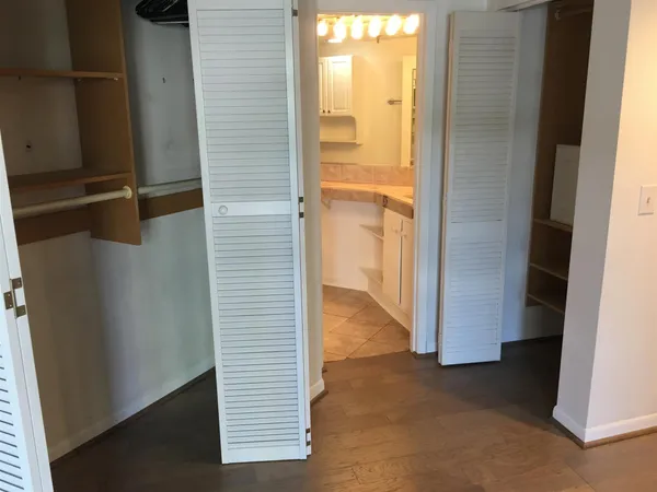 a kitchen with a stove and a microwave