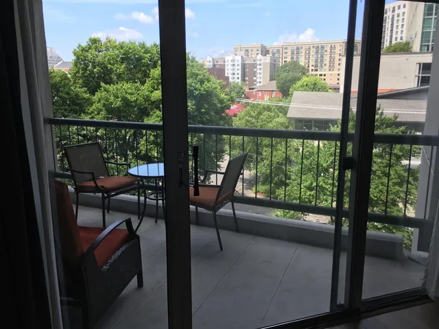 a view of a city from a balcony