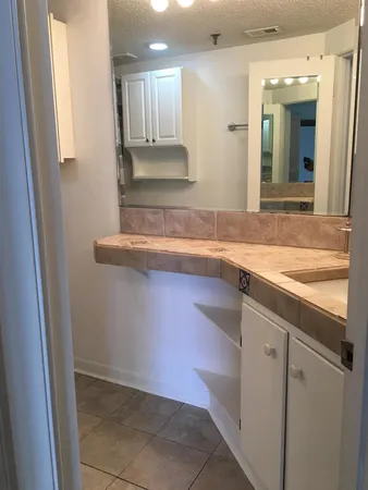 a bathroom with a toilet a sink and a bathtub