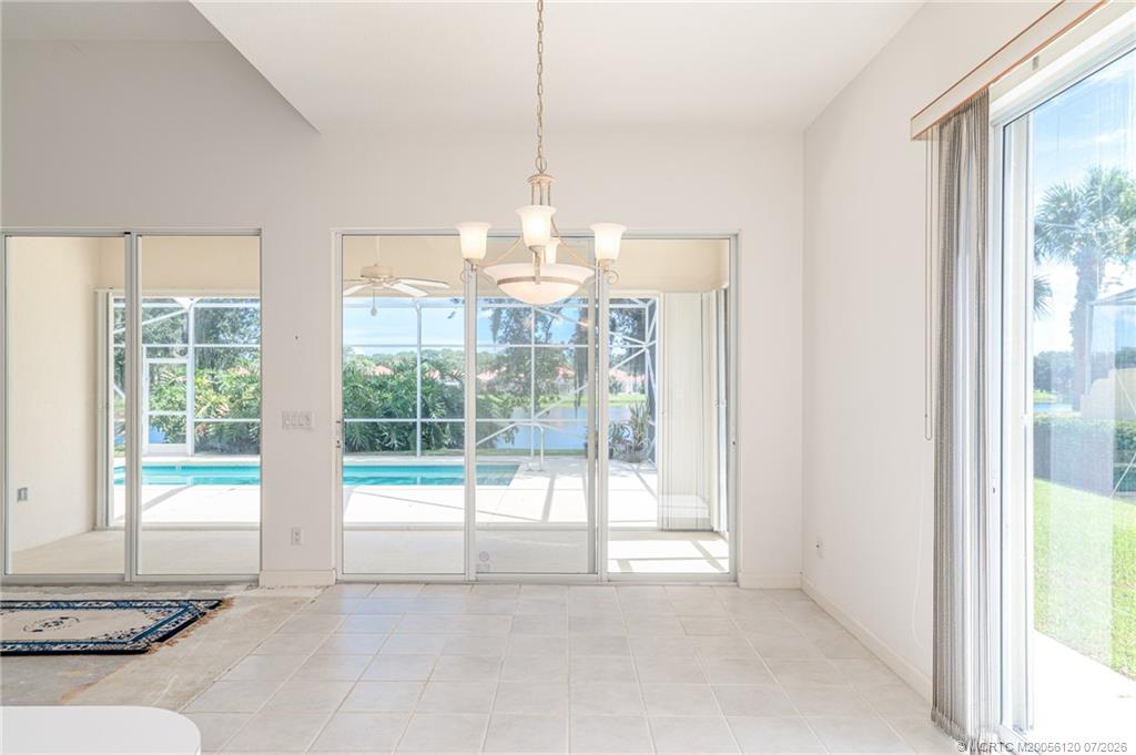 1313 Southwest Balmoral Trace Stuart, FL 34997 - Photo 62 of 70 Current condition - great pool and lake view from here