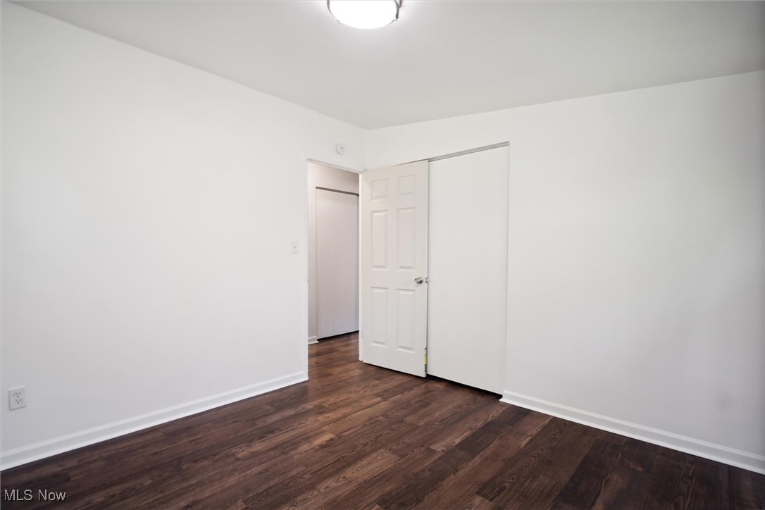 6683 Sherborn Road Cleveland, OH 44130 - Photo 29 of 42 Unfurnished room with dark hardwood / wood-style flooring