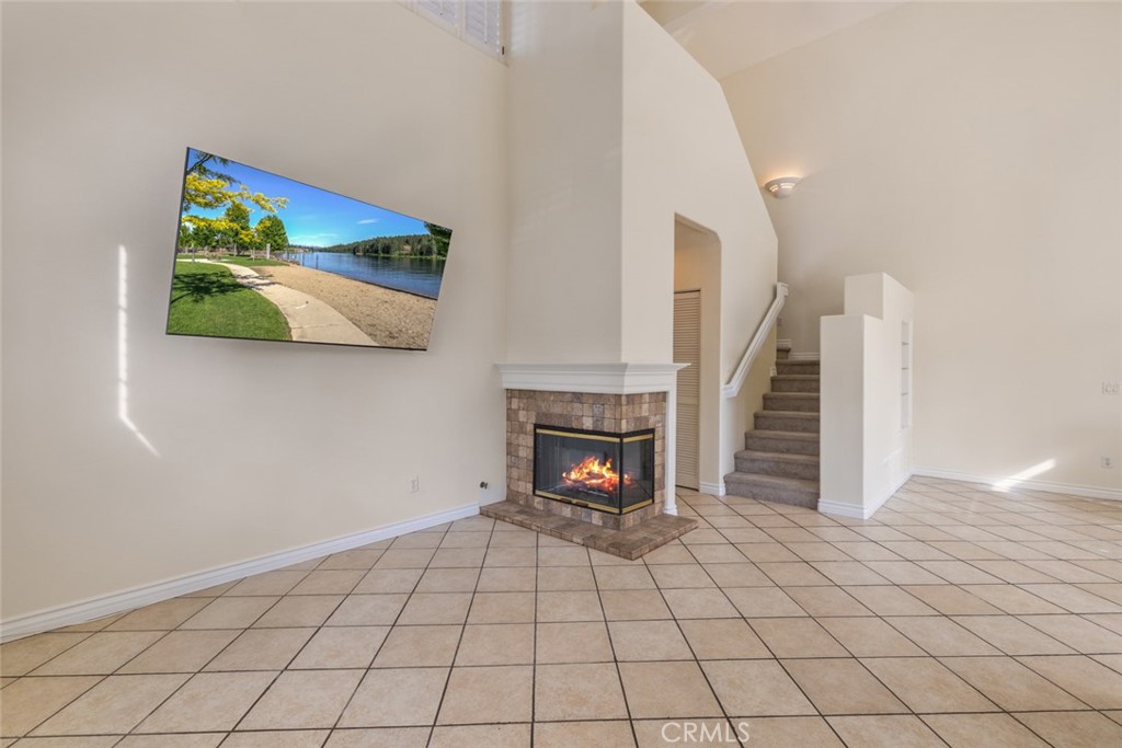 5 Montara Drive Aliso Viejo, CA 92656 - Photo 6 of 26 a view of an empty room with a fireplace