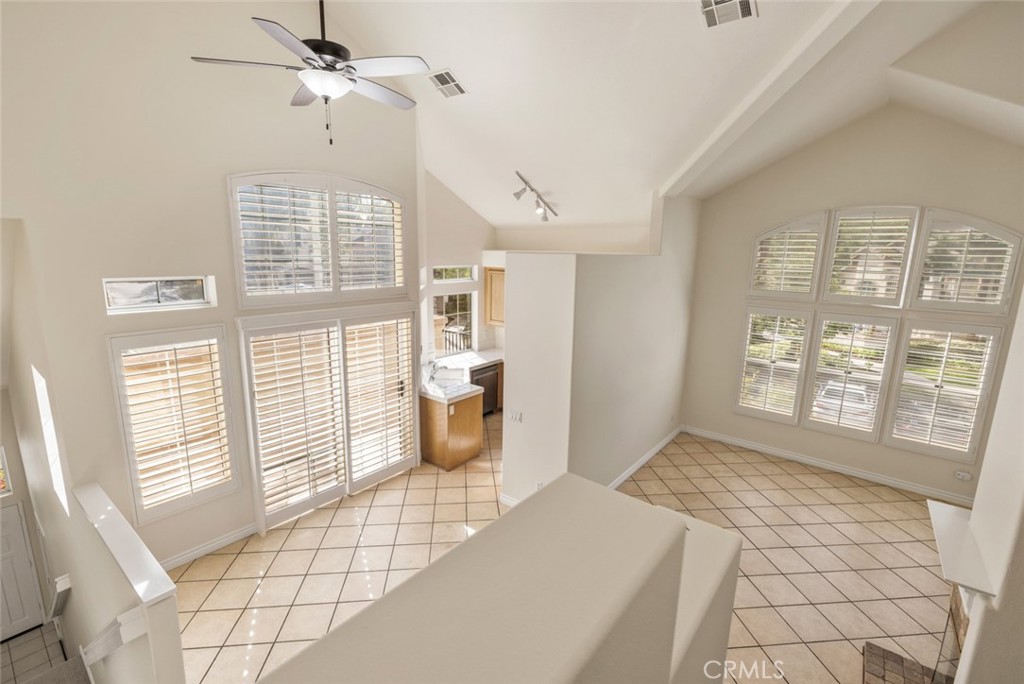 5 Montara Drive Aliso Viejo, CA 92656 - Photo 10 of 26 a spacious bedroom with a large bed and a window