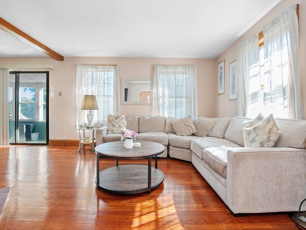 14 Willard Street Waltham, MA 02451 - Photo 12 of 36 a living room with furniture and wooden floor
