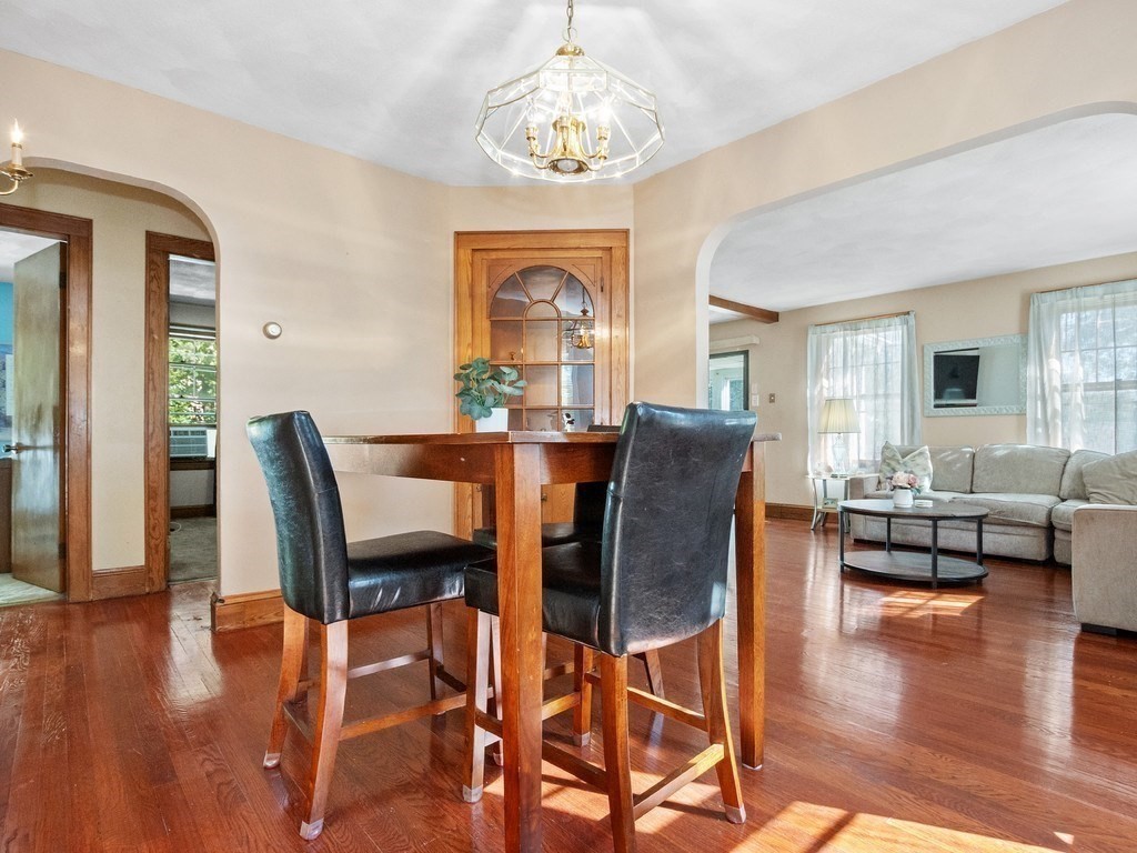 14 Willard Street Waltham, MA 02451 - Photo 15 of 36 a view of a dining room with furniture window and wooden floor