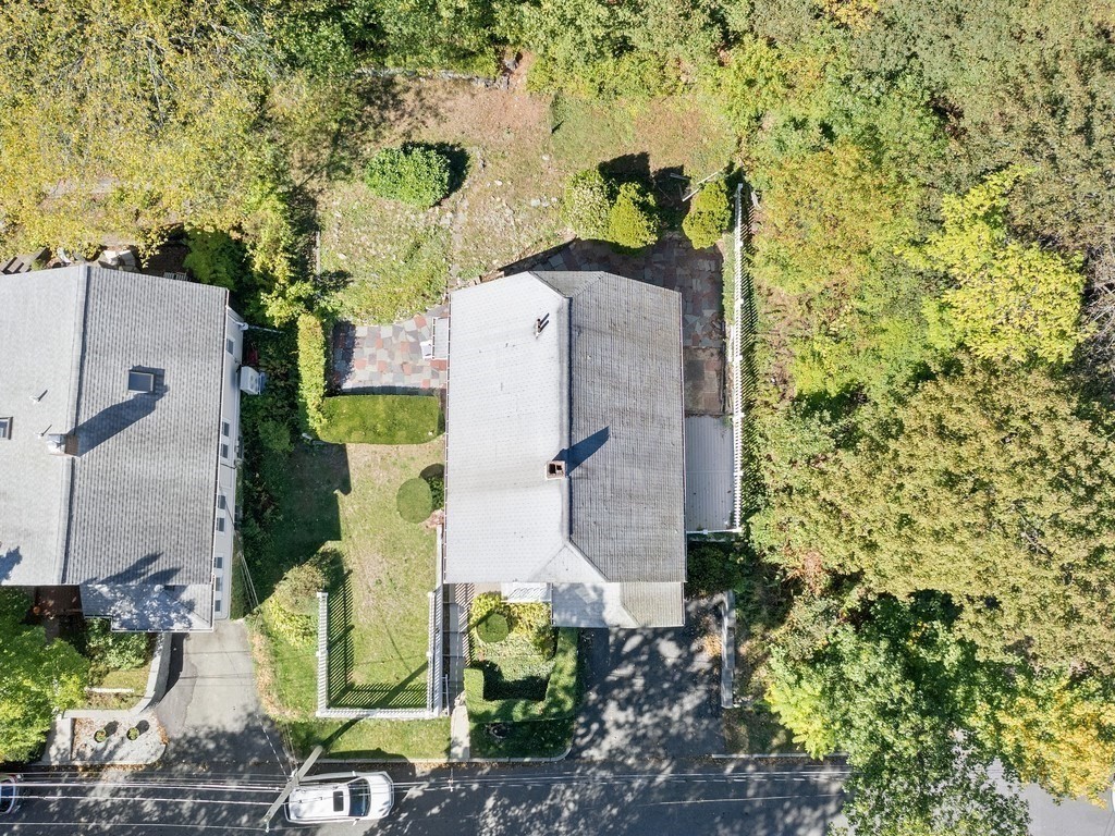 14 Willard Street Waltham, MA 02451 - Photo 32 of 36 an aerial view of a house with a yard and large tree
