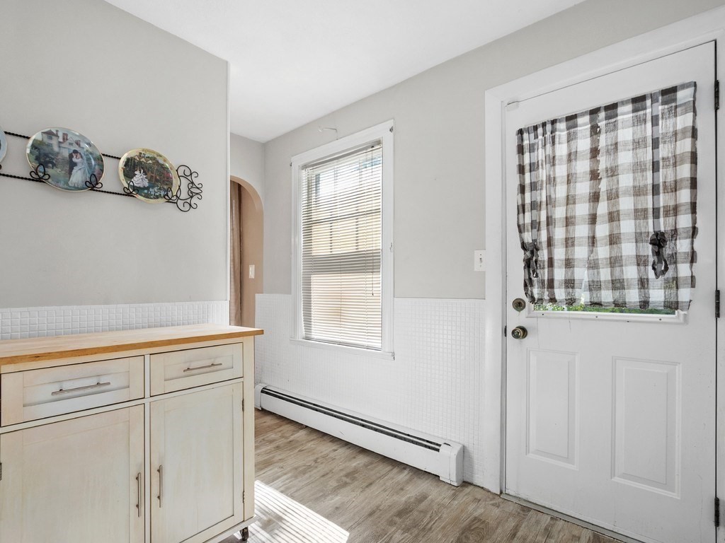 14 Willard Street Waltham, MA 02451 - Photo 6 of 36 a view of an empty room with a window