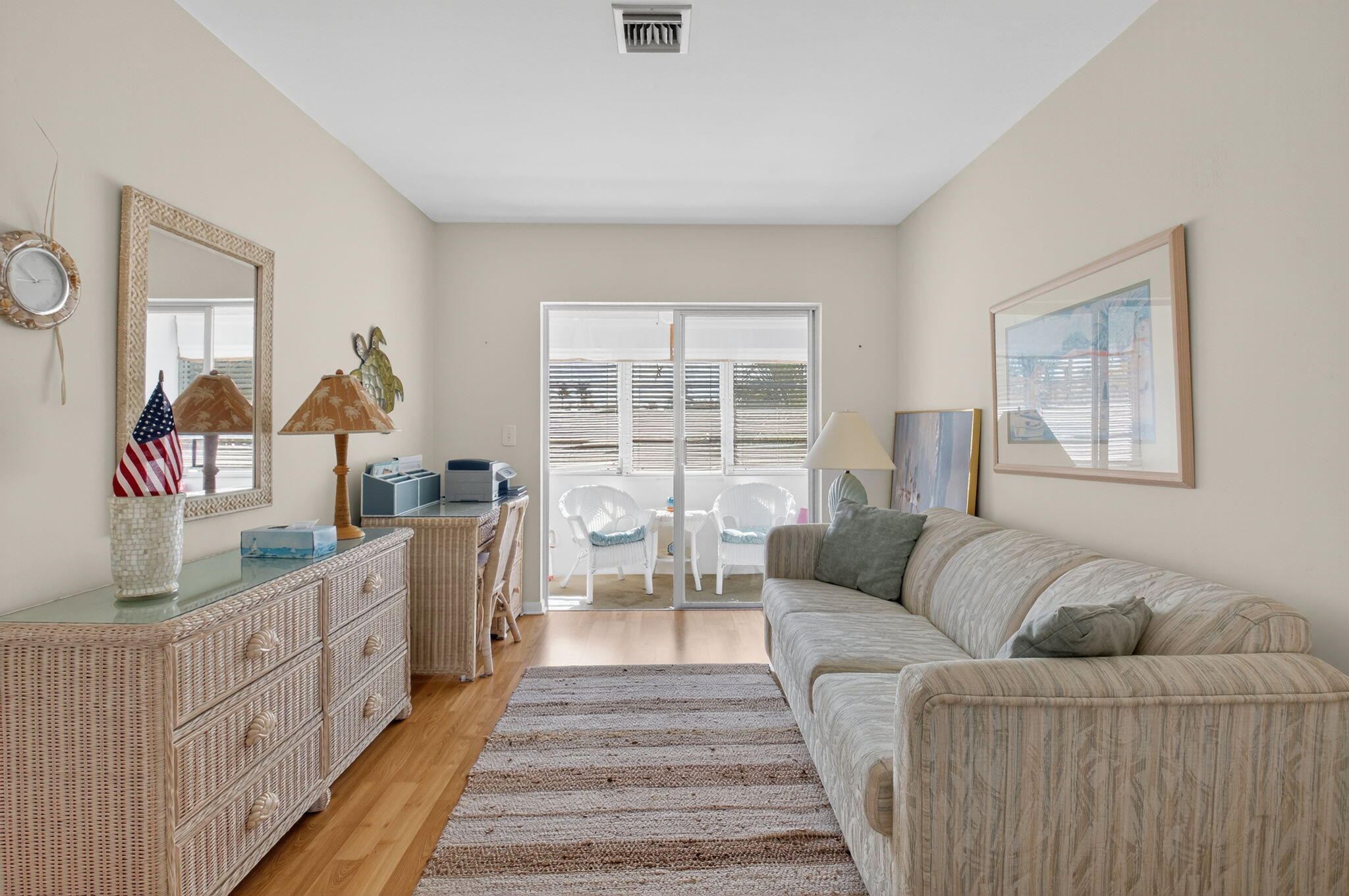 5505 North Ocean Boulevard, Unit 8204 Ocean Ridge, FL 33435 - Photo 17 of 47 a living room with furniture and a large window