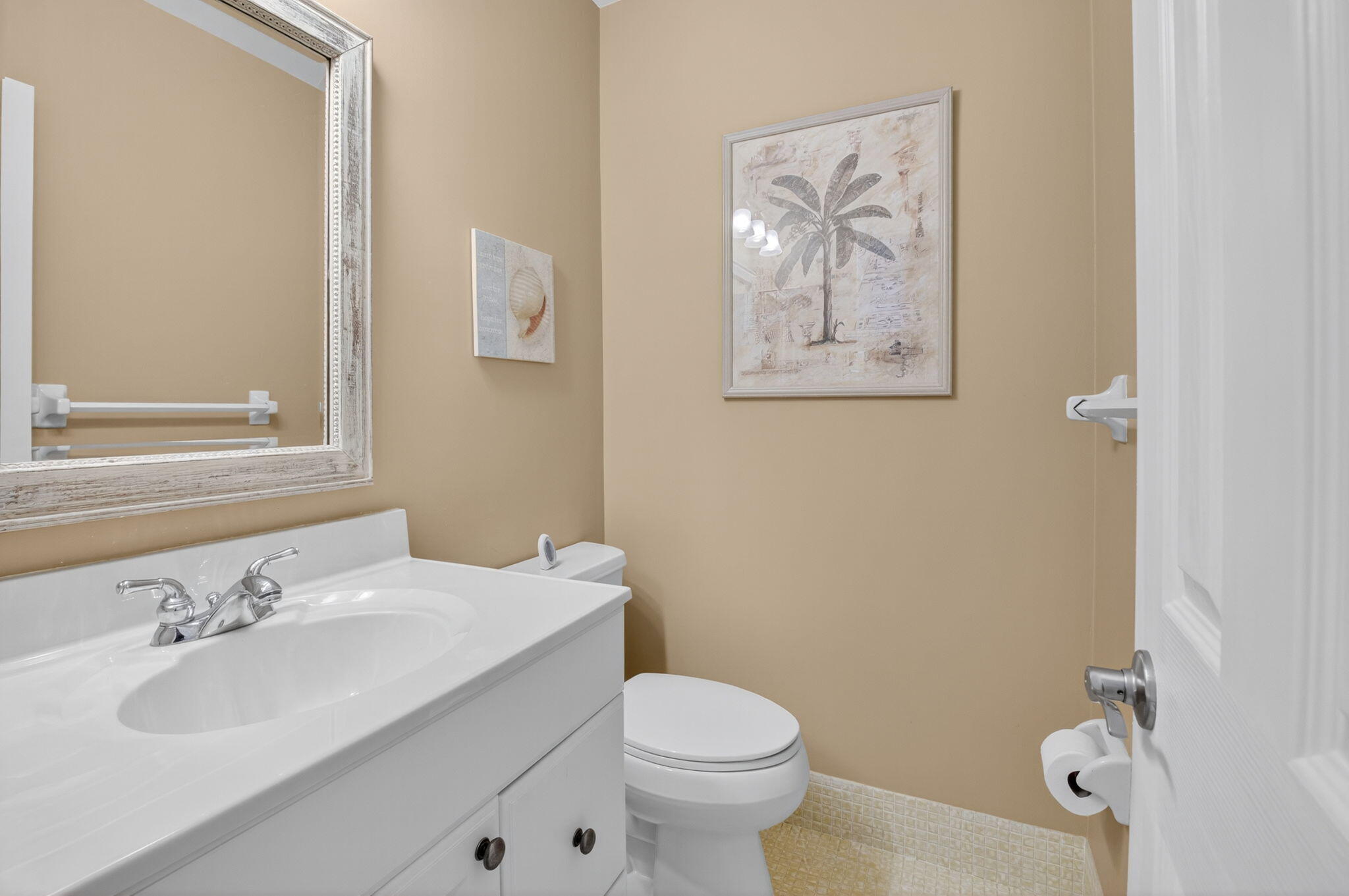 5505 North Ocean Boulevard, Unit 8204 Ocean Ridge, FL 33435 - Photo 20 of 47 a bathroom with a sink mirror and toilet