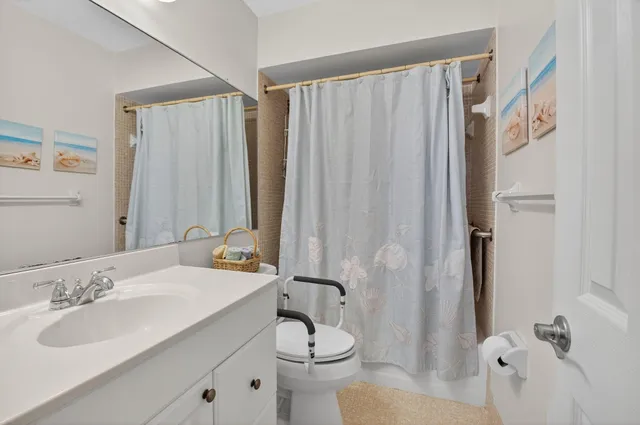 a view of storage and utility room with racks on the wall