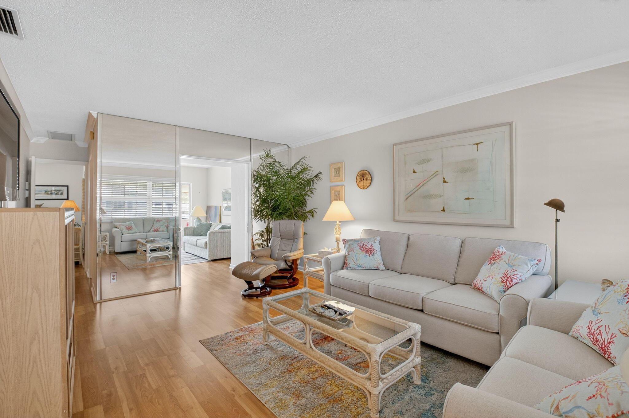 5505 North Ocean Boulevard, Unit 8204 Ocean Ridge, FL 33435 - Photo 9 of 47 a living room with furniture and a table