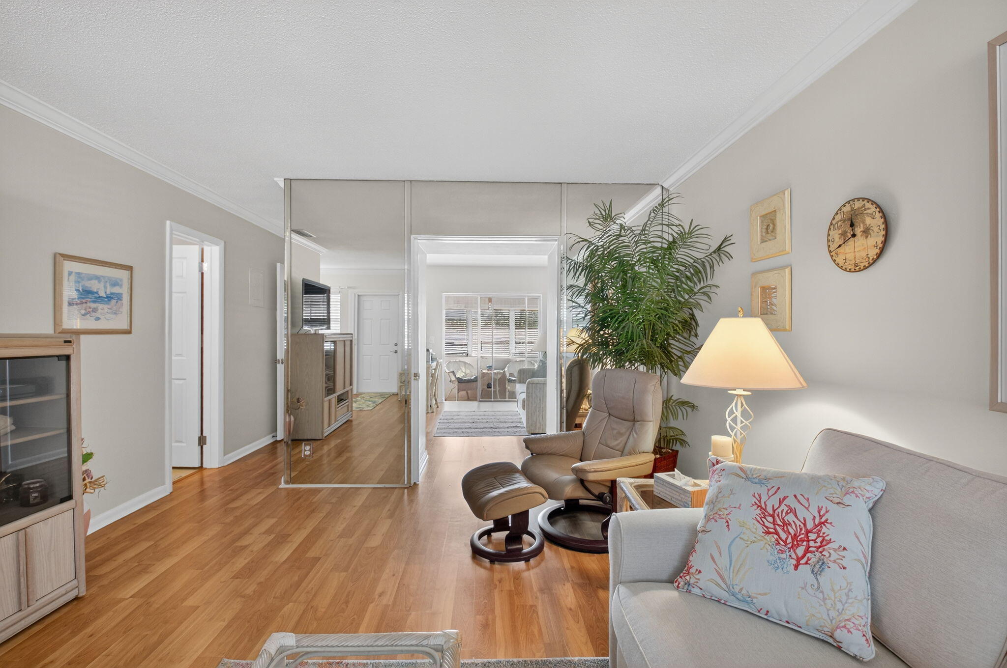 5505 North Ocean Boulevard, Unit 8204 Ocean Ridge, FL 33435 - Photo 10 of 47 a living room with furniture and a table