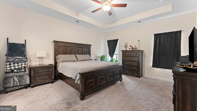 a bathroom with a sink double vanity and a mirror