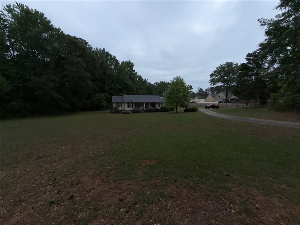 217 Babbs Mill Road Hampton, GA 30228 - Photo 11 of 39 a view of a lake with houses in outdoor space