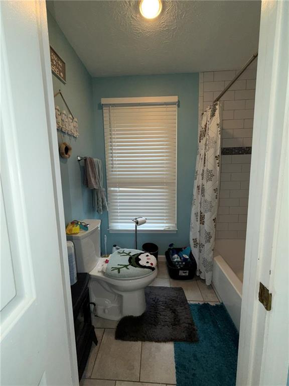 217 Babbs Mill Road Hampton, GA 30228 - Photo 23 of 39 a bathroom with a sink toilet and shower