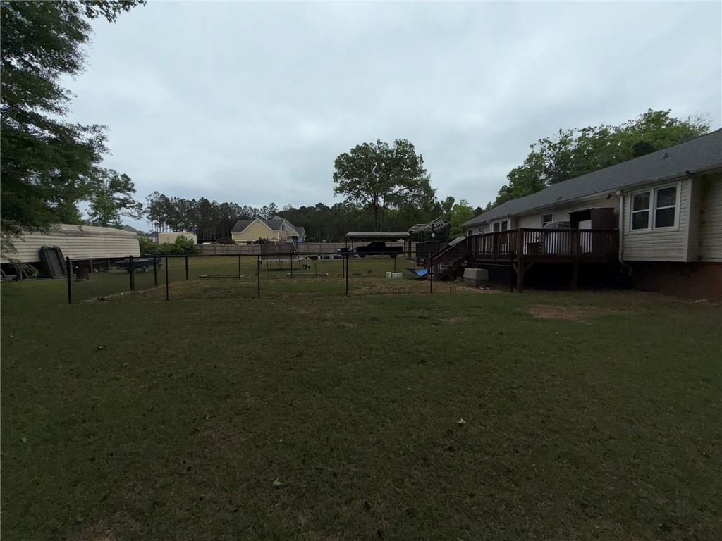 217 Babbs Mill Road Hampton, GA 30228 - Photo 39 of 39 a view of a house with a yard