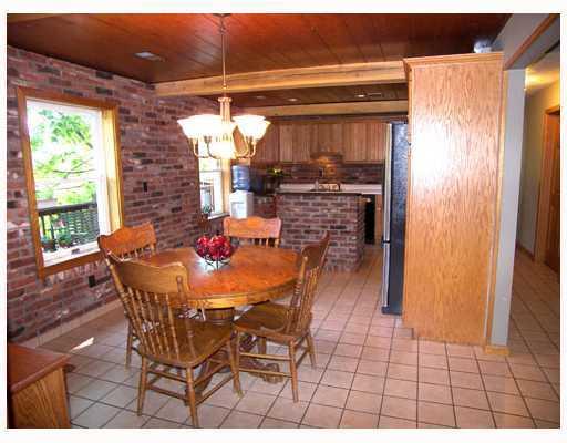 139 Paul Good Road Greensburg, PA 15601 - Photo 2 of 8 Kitchen. Fully Equipped Eat in kitchen includes exposed brick & a kitchen island