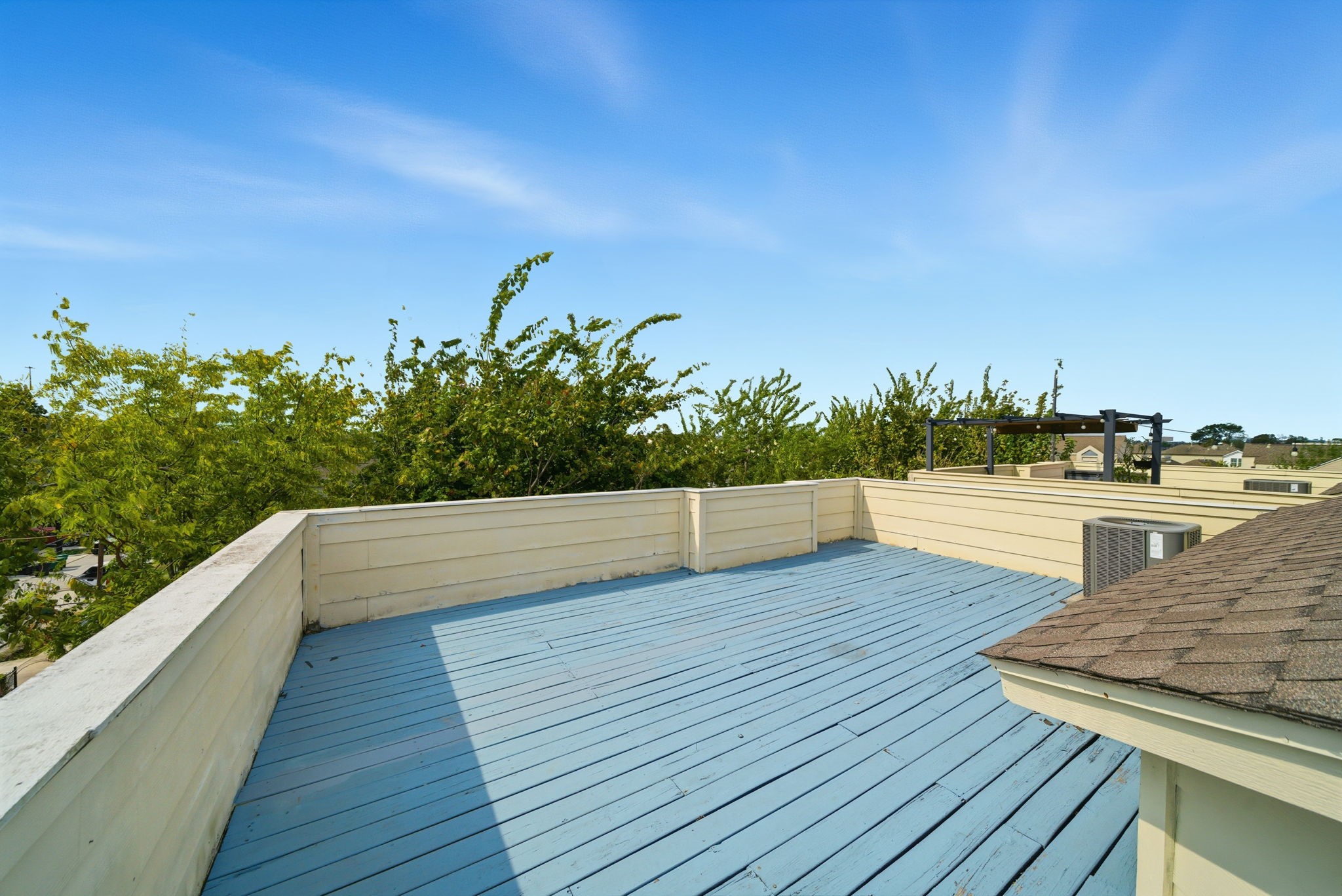 5310 Larkin Street, Unit B Houston, TX 77007 - Photo 35 of 36 a view of a balcony with wooden floor