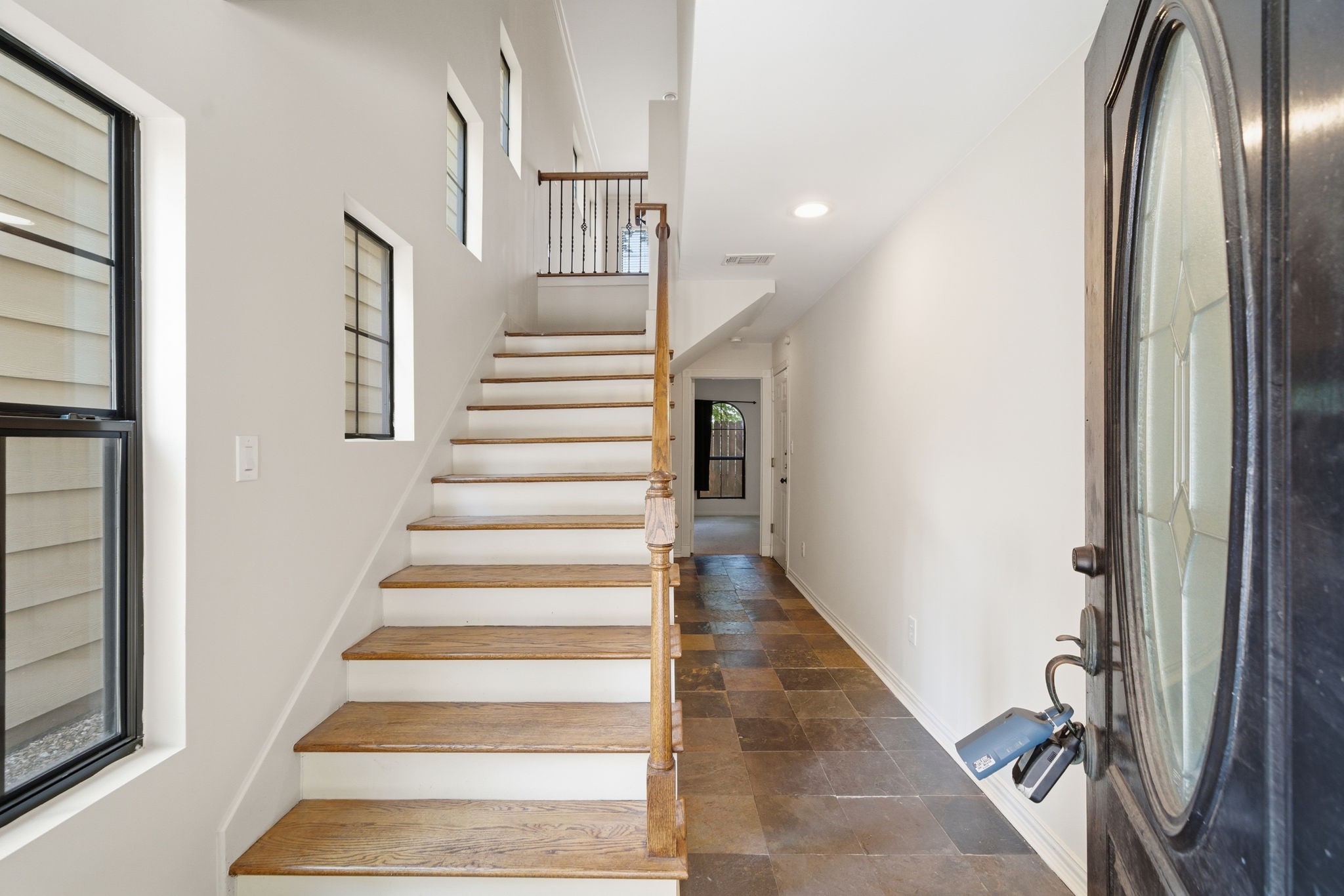 5310 Larkin Street, Unit B Houston, TX 77007 - Photo 5 of 36 a view of entryway and hall with wooden floor